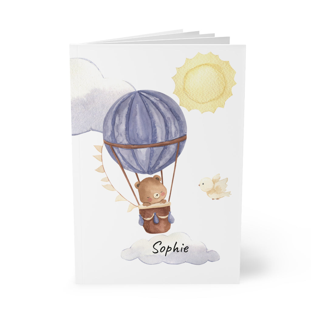 Personalized balloon bear notebook held in hand showing A5 size