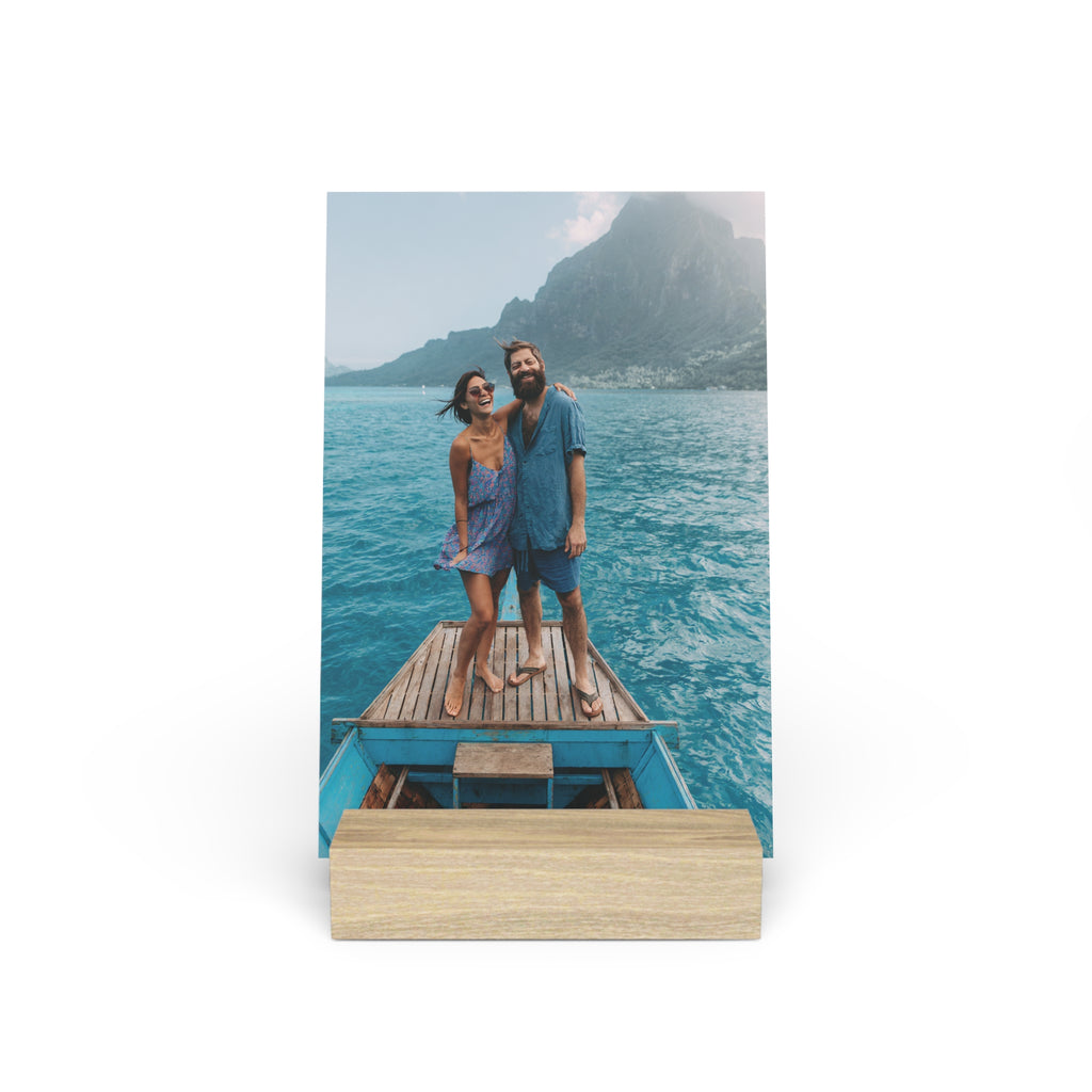 Personalized couple photo stand with photo of couple on a boat near tropical mountains
