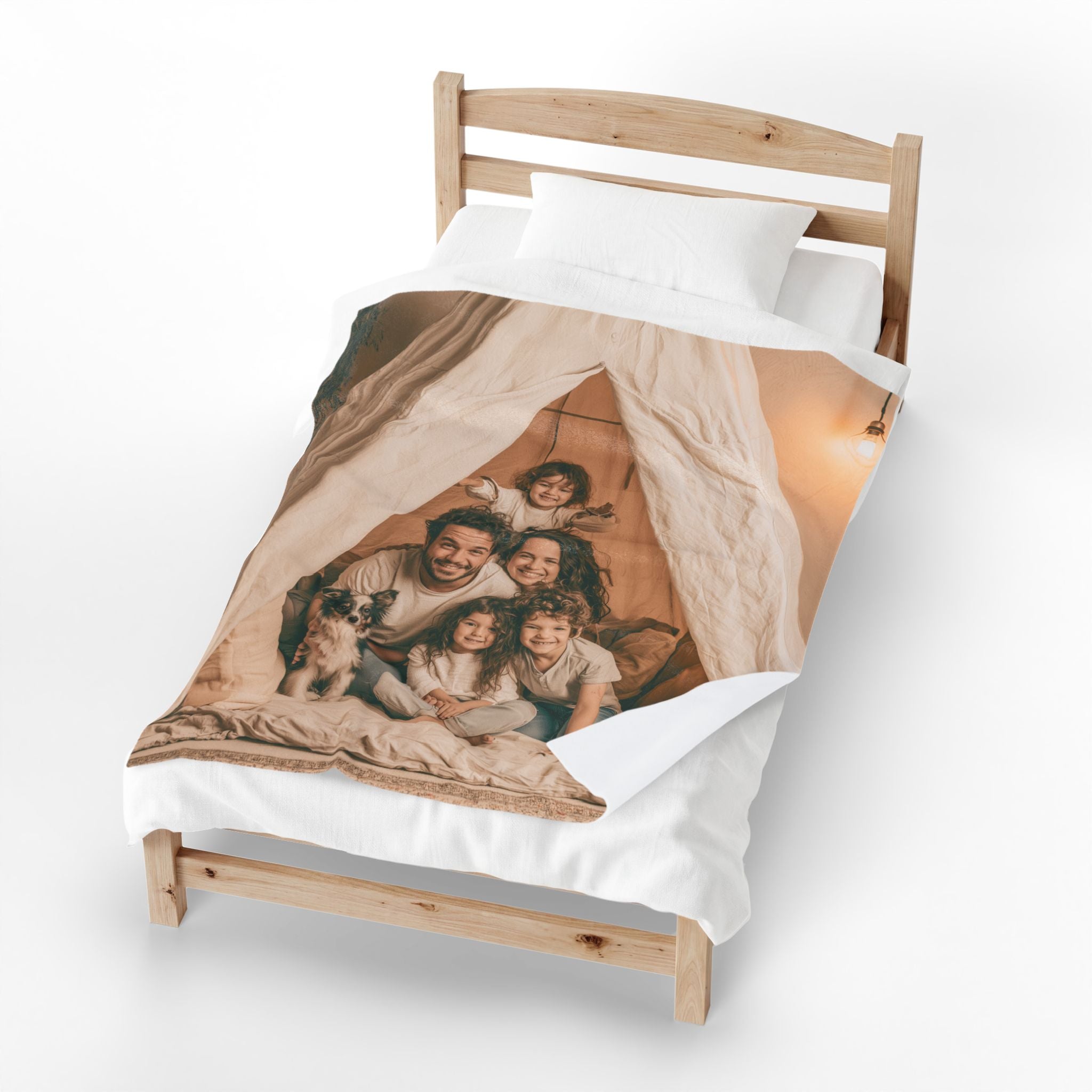 Personalized family photo blanket folded and displayed on a shelf