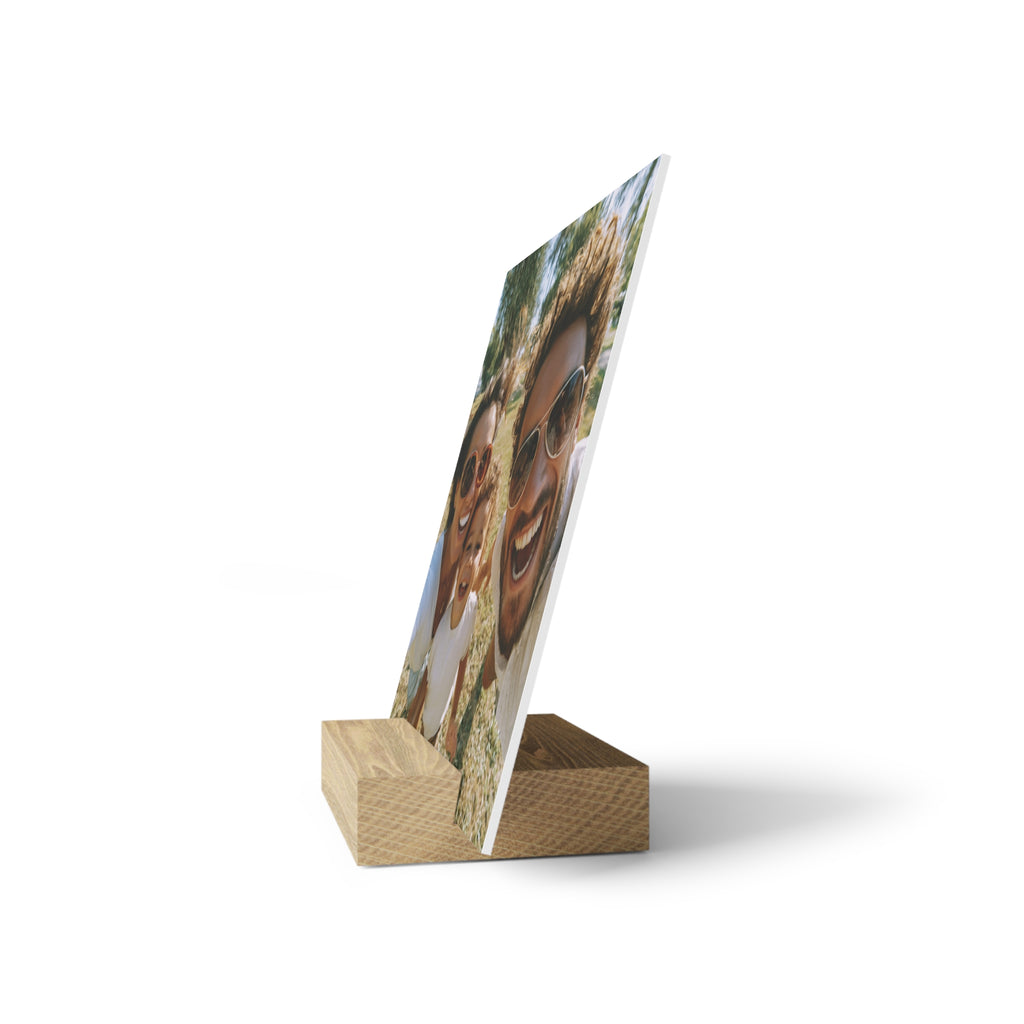Personalized family photo stand on a bedside table