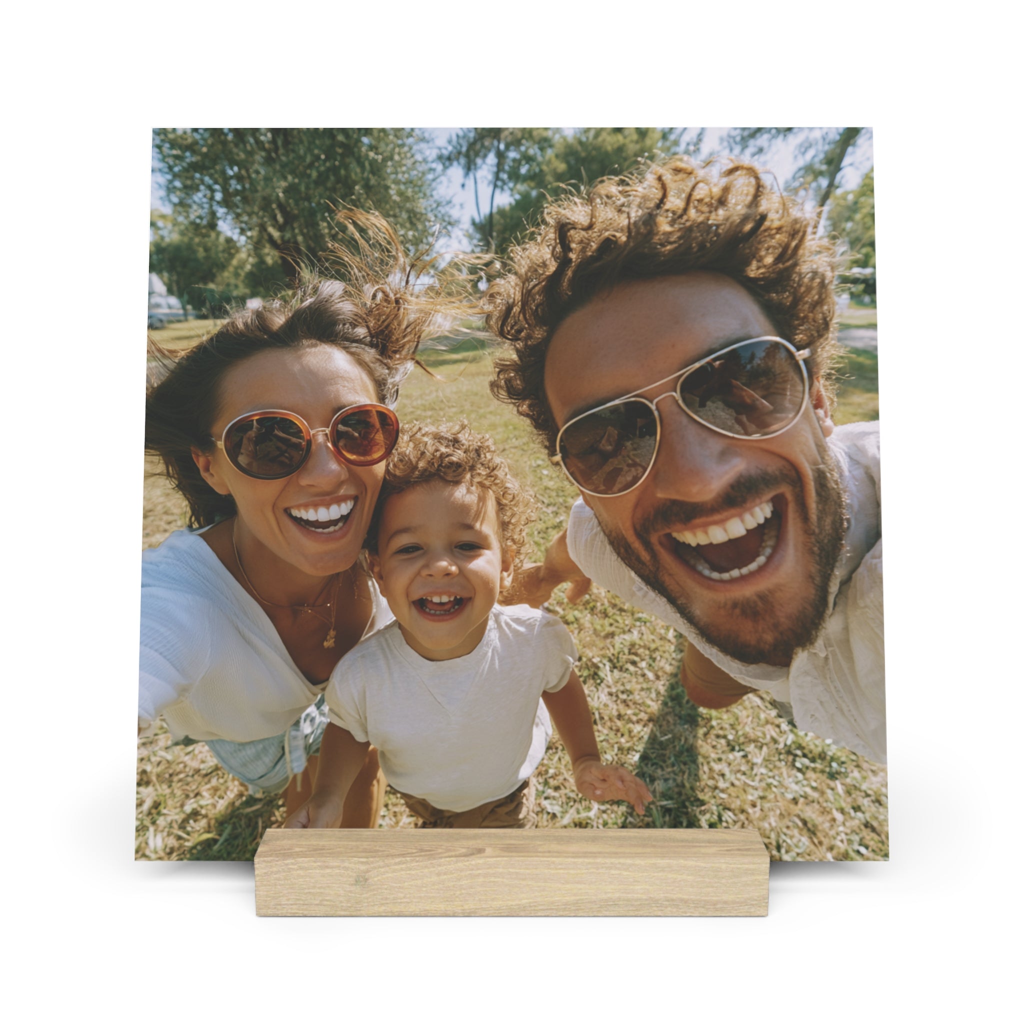 Personalized family photo stand with photo of parents and toddler outdoors