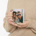 Personalized photo mug held in hand showing family selfie print