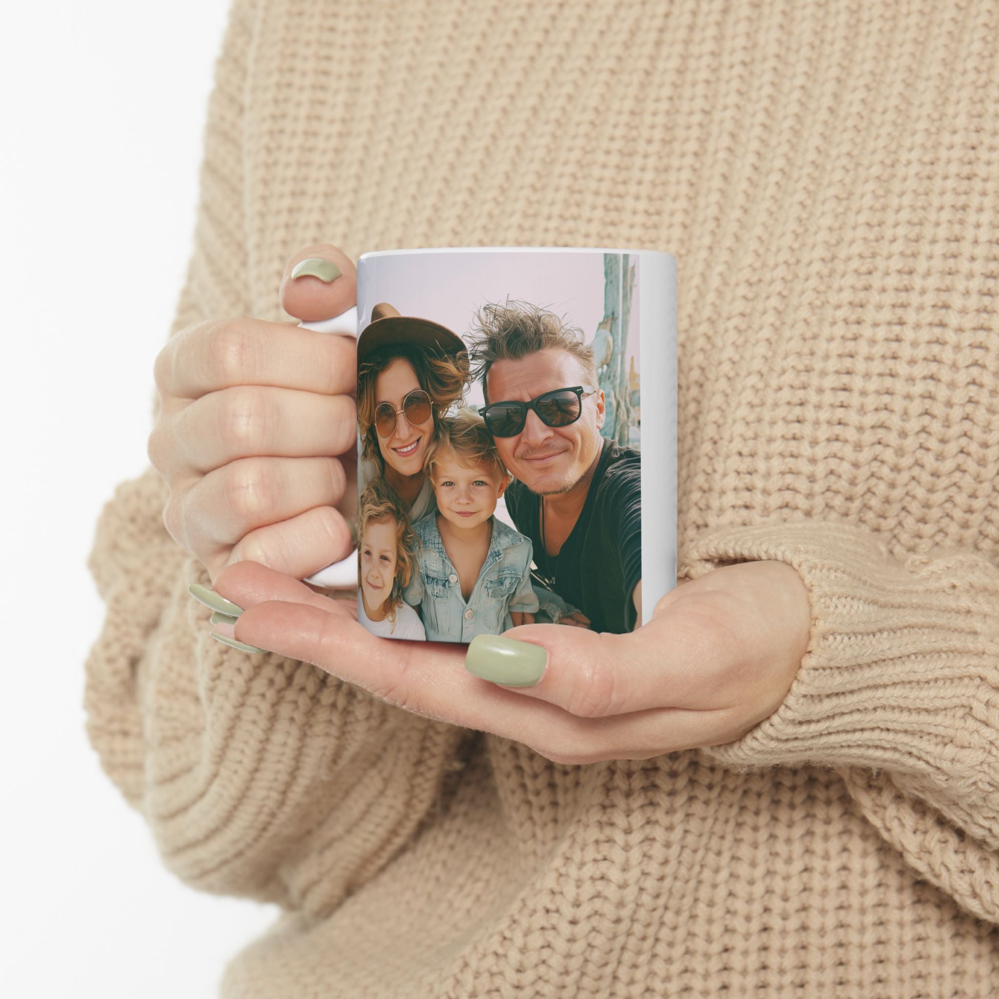 Personalized photo mug held in hand showing family selfie print