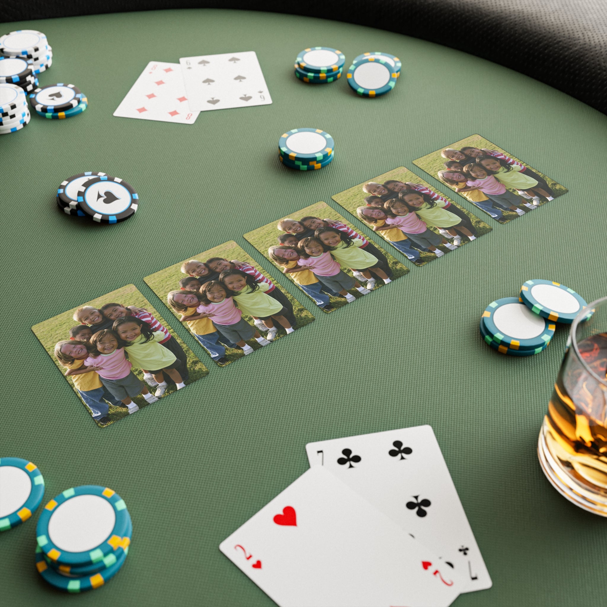 Personalized playing cards held in hand during a card game