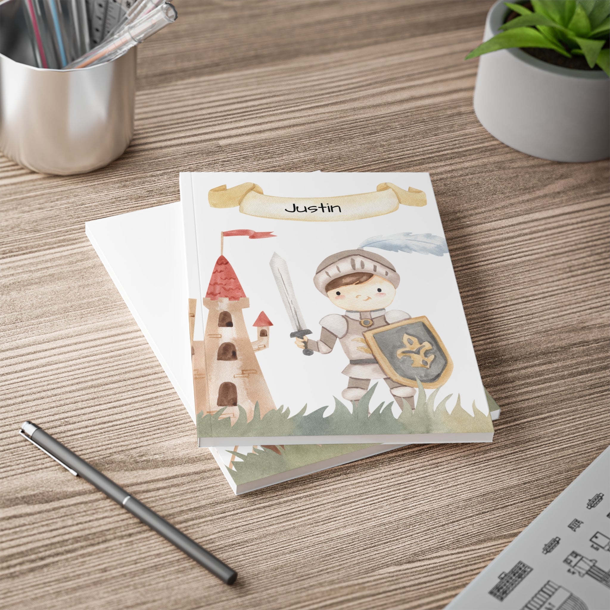 Personalized knight notebook shown open lying flat